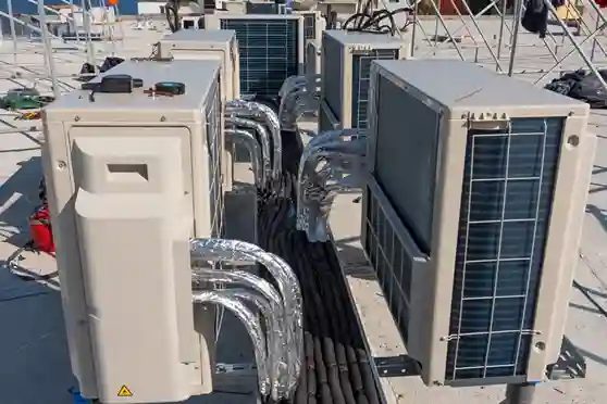 VRV outdoor air conditioning units installed on a commercial rooftop HVAC system.