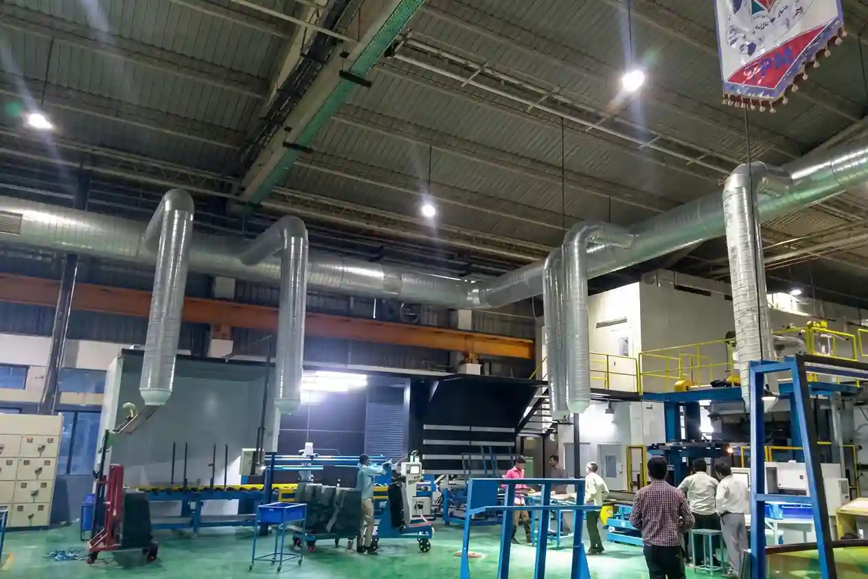 Large-scale industrial ventilation project showing galvanized steel ducting in unit