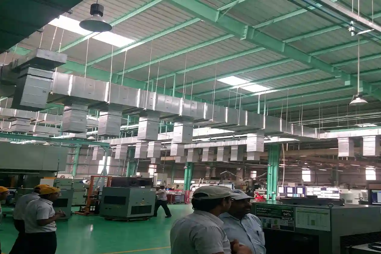 Overhead rectangular GI ducting network with multiple vertical air drops in a manufacturing plant